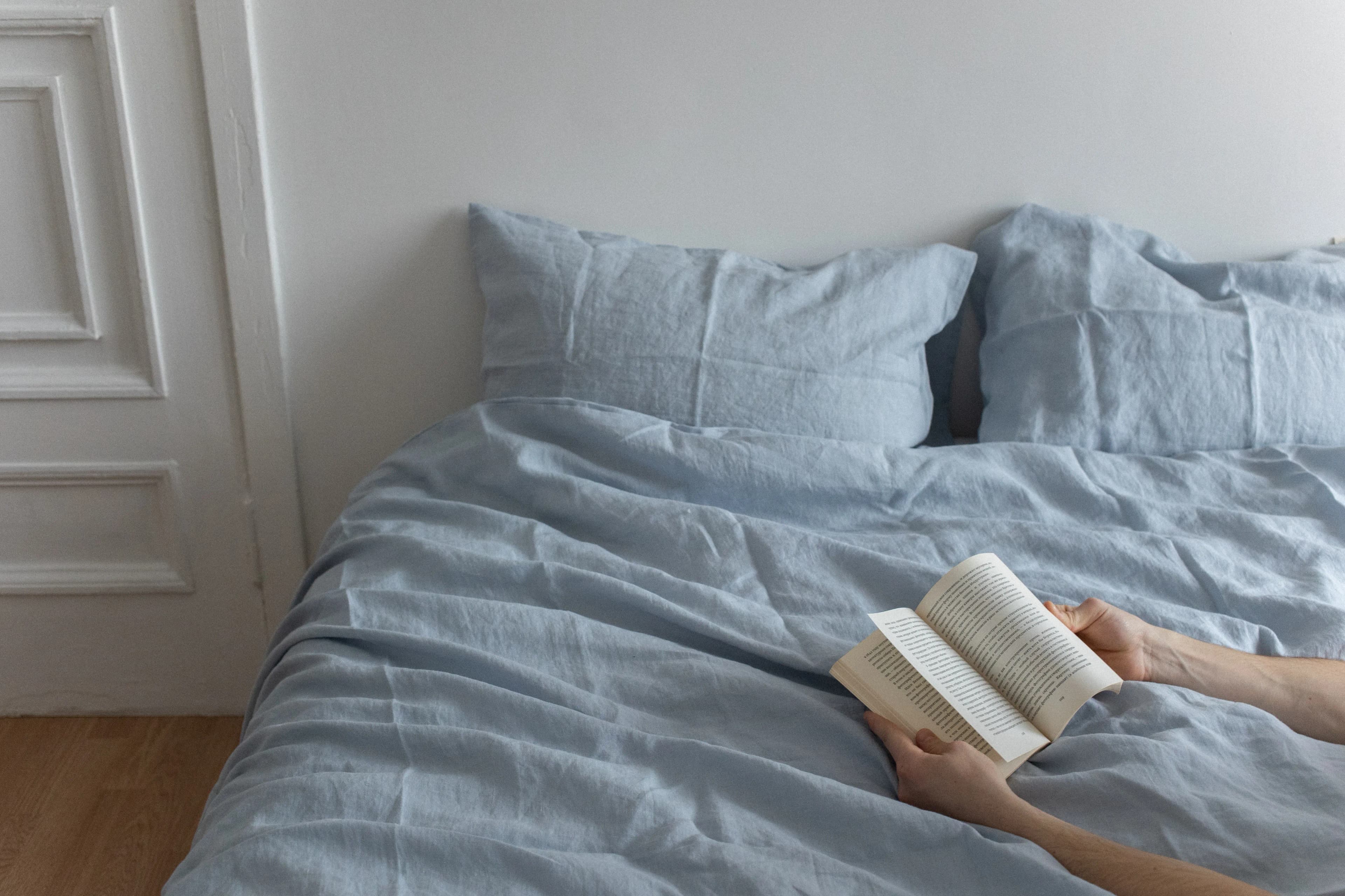 A gift of MoonRoe bedding, unwrapped in soft light